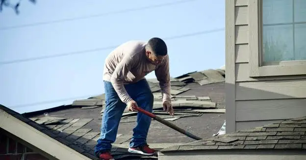 What does a roofing contractor do
